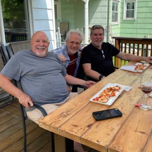 A picture of Wayne, David, and John on Wayne's deck -- about to enjoy the meal Wayne just cooked for us.